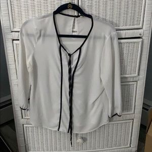 White blouse with black details